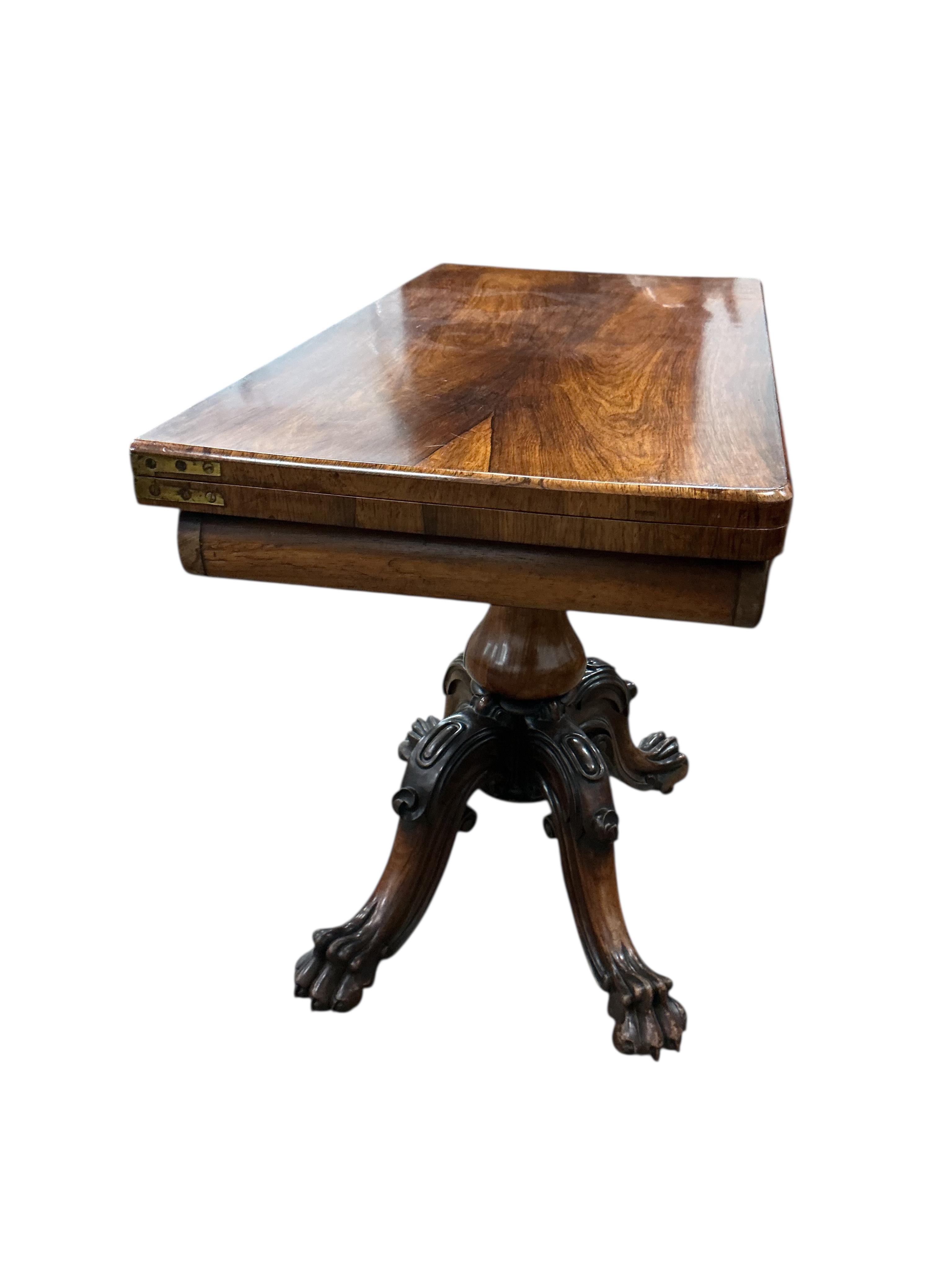 An early Victorian rectangular folding rosewood card table, width 91cm, depth 45cm, height 73cm